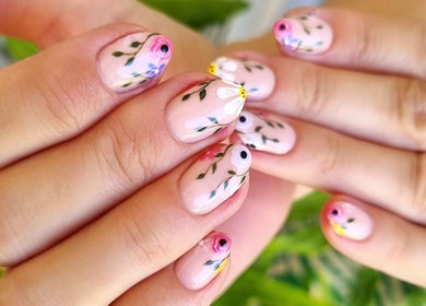 Floral nail art at Nails by Chanelle, Westville, KwaZulu-Natal, ZA showcasing delicate hand-painted designs.
