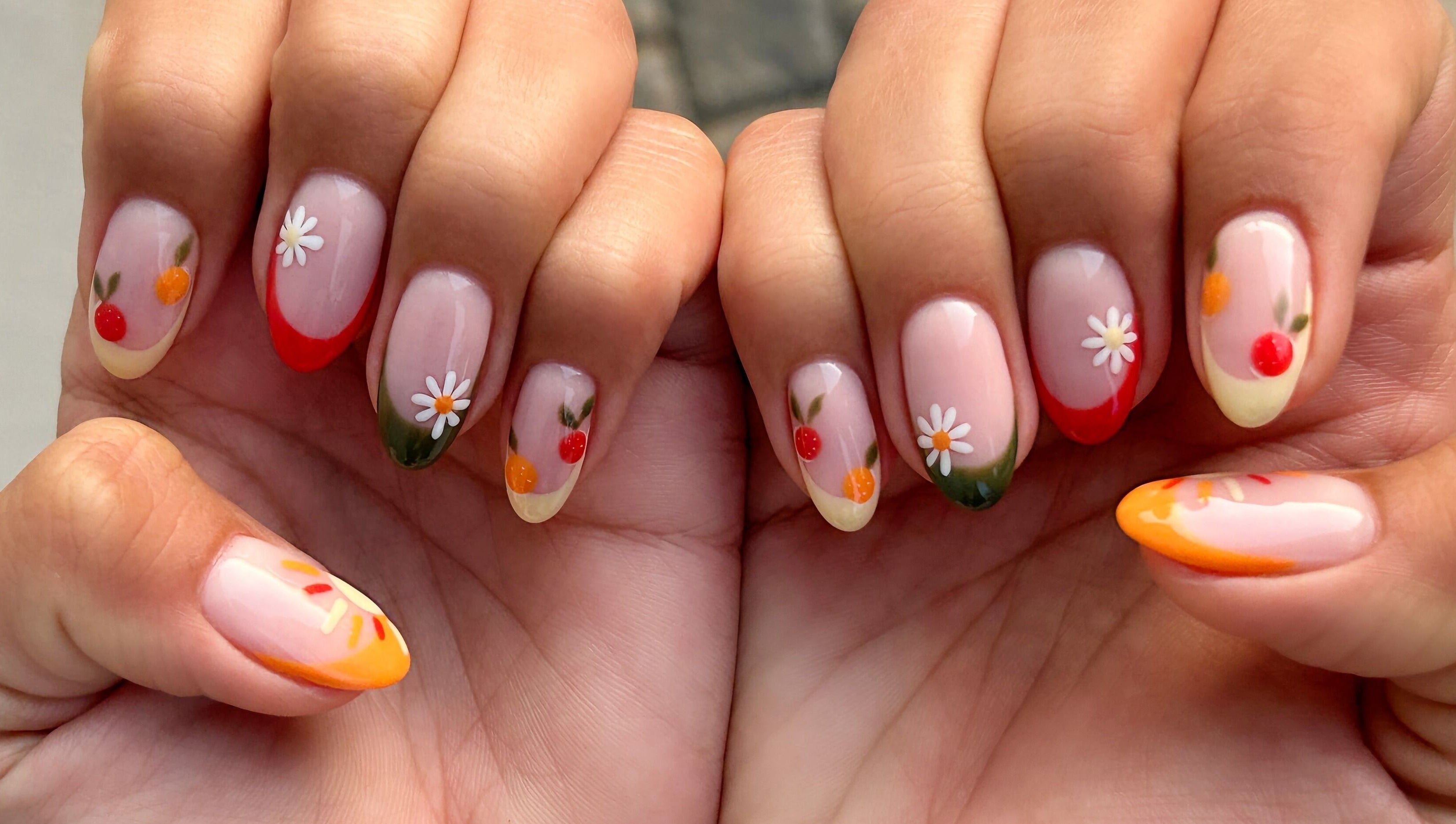 Stylish floral nail art at Nel White Nails, Umhlanga, Kwazulu-natal, ZA, showcasing vibrant colors and designs.