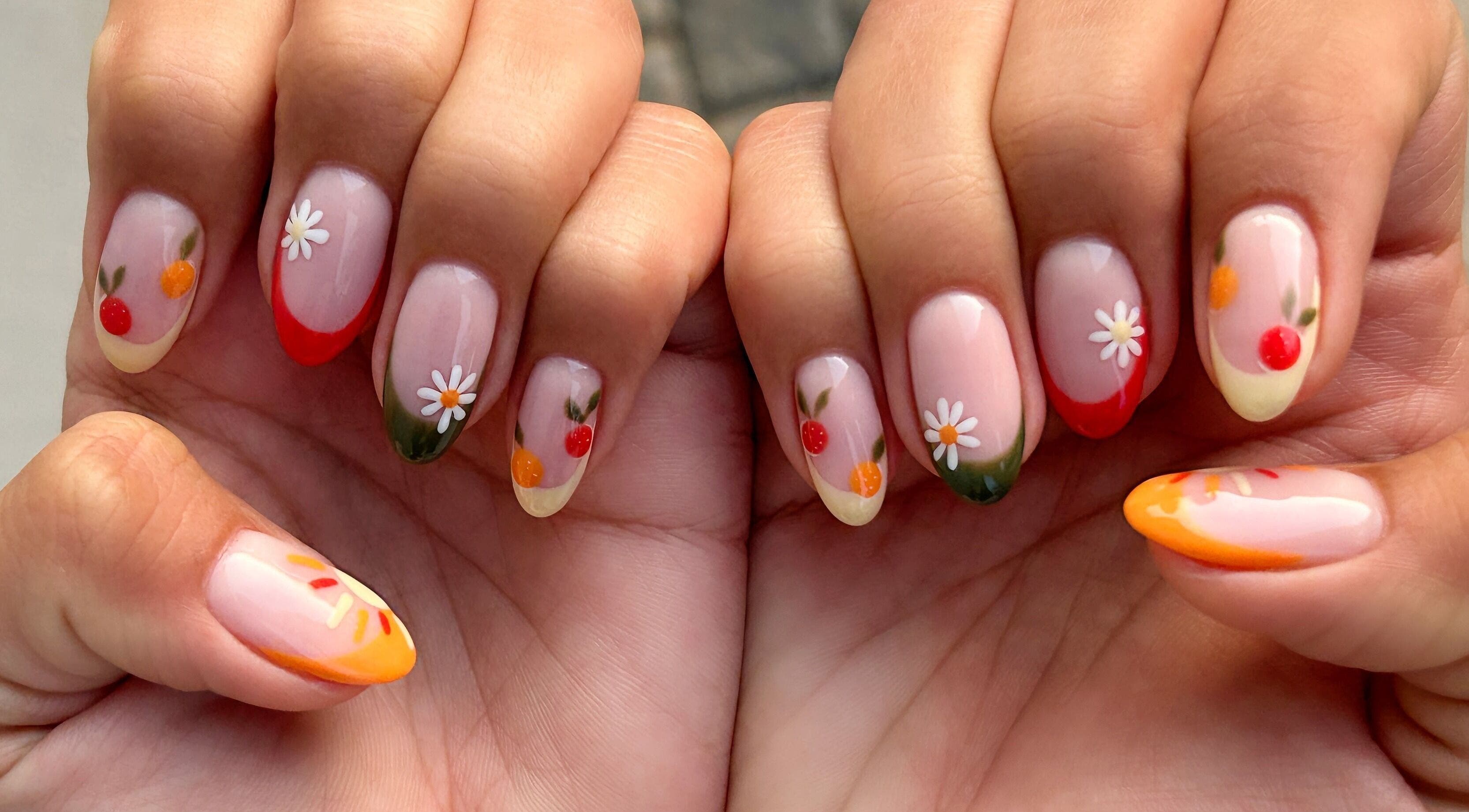 Stylish floral nail art at Nel White Nails, Umhlanga, Kwazulu-natal, ZA, showcasing vibrant colors and designs.