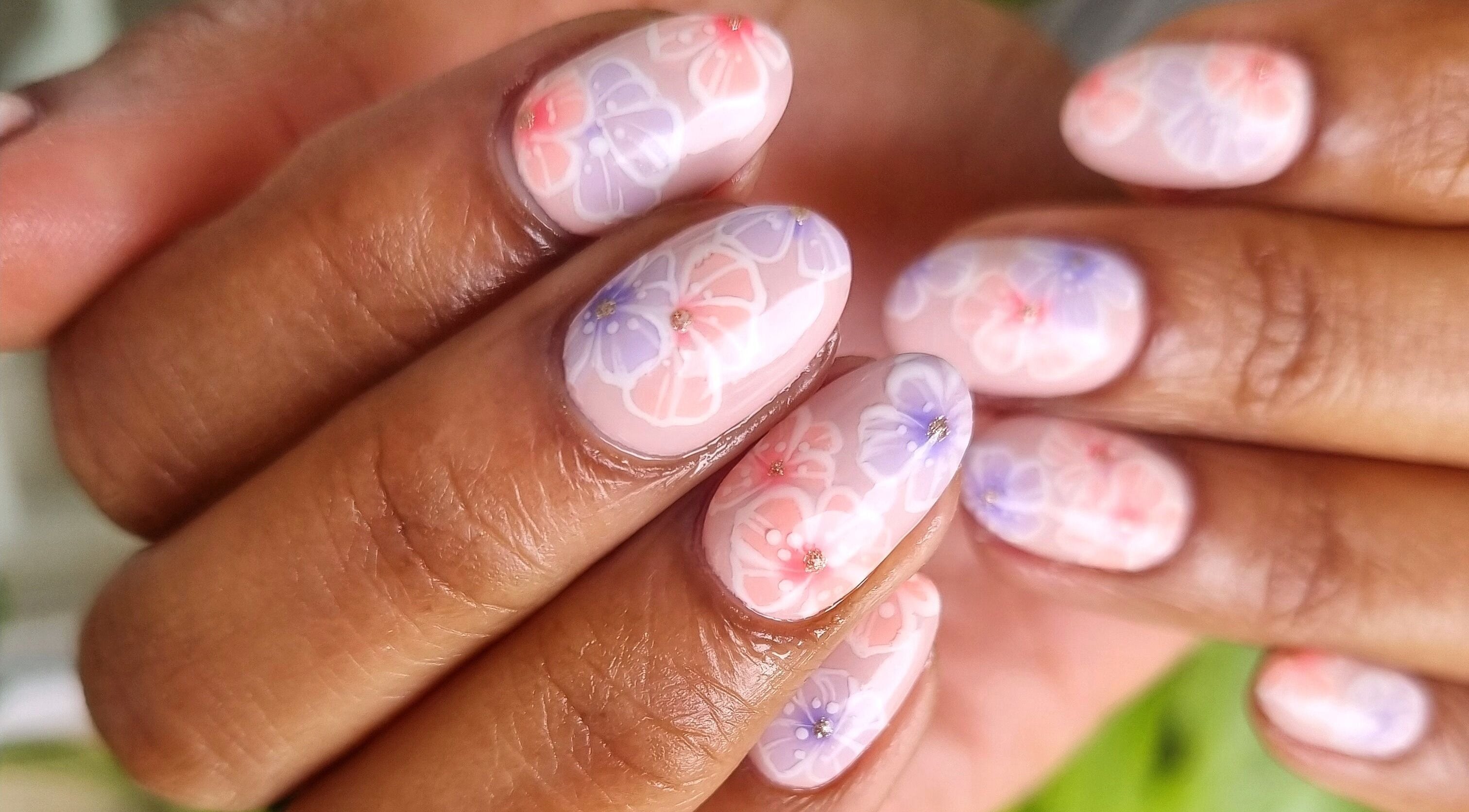 Exquisite floral nail art at Nel White Nails, Umhlanga, Kwazulu-natal, ZA showcasing detailed pastel designs.