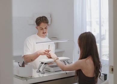 Nail technician providing manicure at Beauty Lane Tamworth, New South Wales, AU.