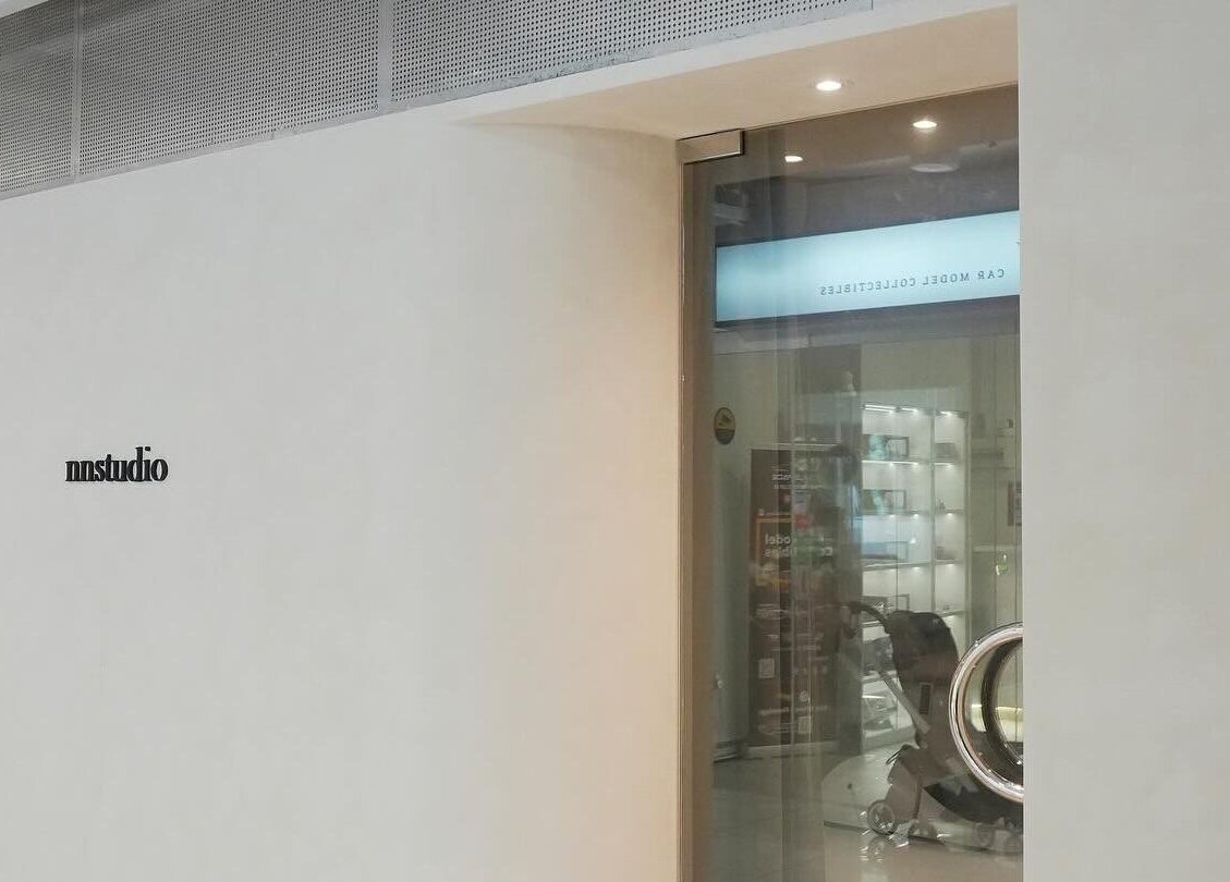 Sleek nnstudio entrance in Singapore, Singapore, SG, showcasing a modern design aesthetic.
