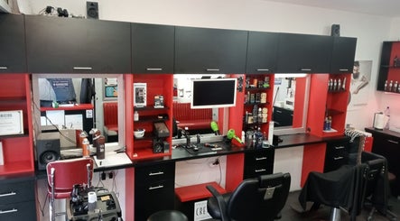 Modern barber setup at Route 66 Barber Shop, Ħ'Attard, Malta, MT with stylish black and red design.