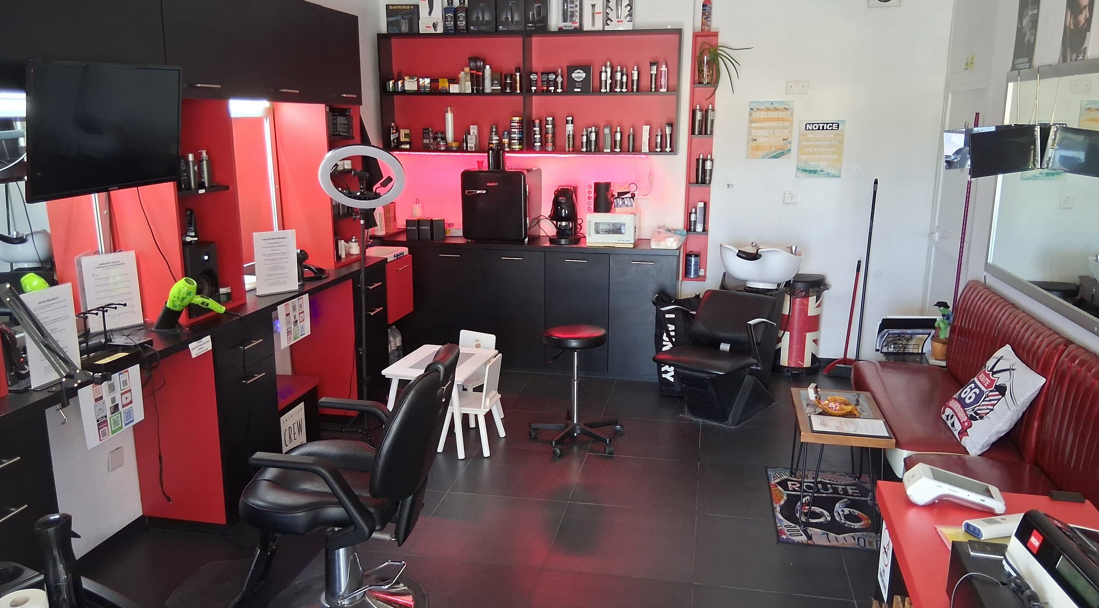 Interior of Route 66 Barber Shop in Ħ'Attard, Malta, MT showcasing modern, stylish décor and professional setup.