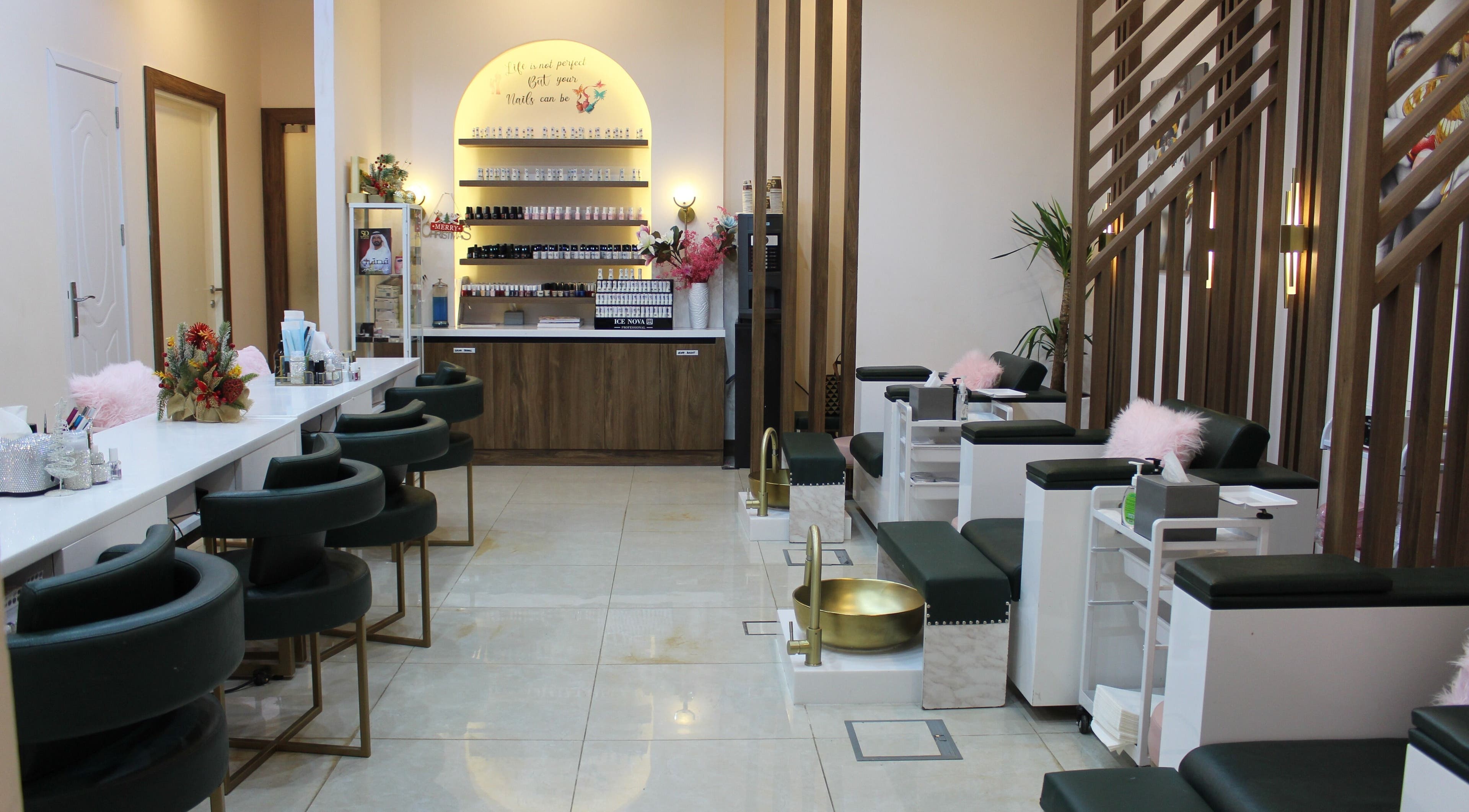Elegant pedicure area with plush seating at Royal Nails Salon, Dubai, Dubai, AE, showcasing modern decor.
