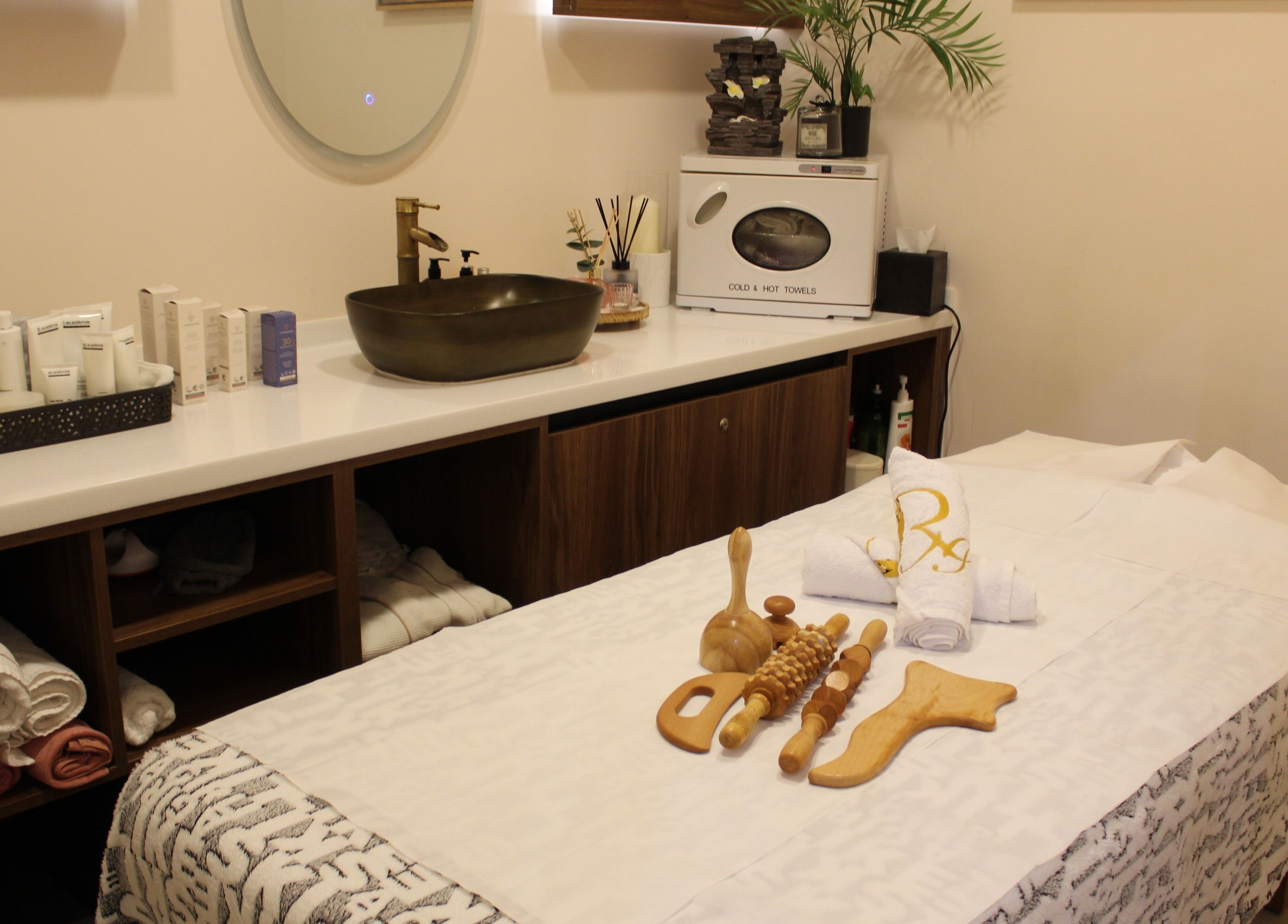 Elegant treatment room at Royal Nails Salon, Dubai, Dubai, AE, featuring massage tools and skincare products.
