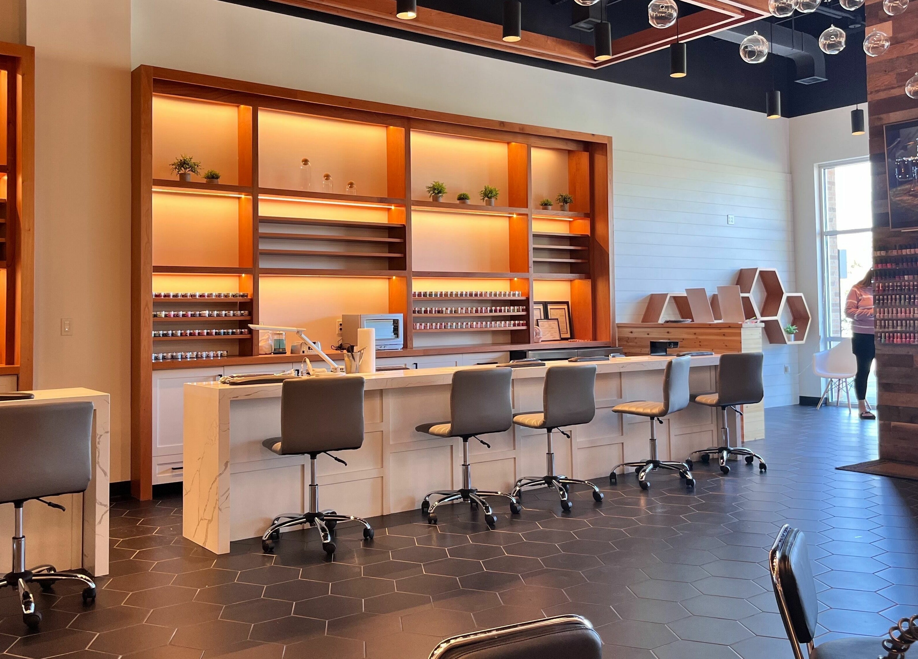 Interior of Bennington Nail Bar, a modern and inviting space in Bennington, Nebraska, US with stylish seating.