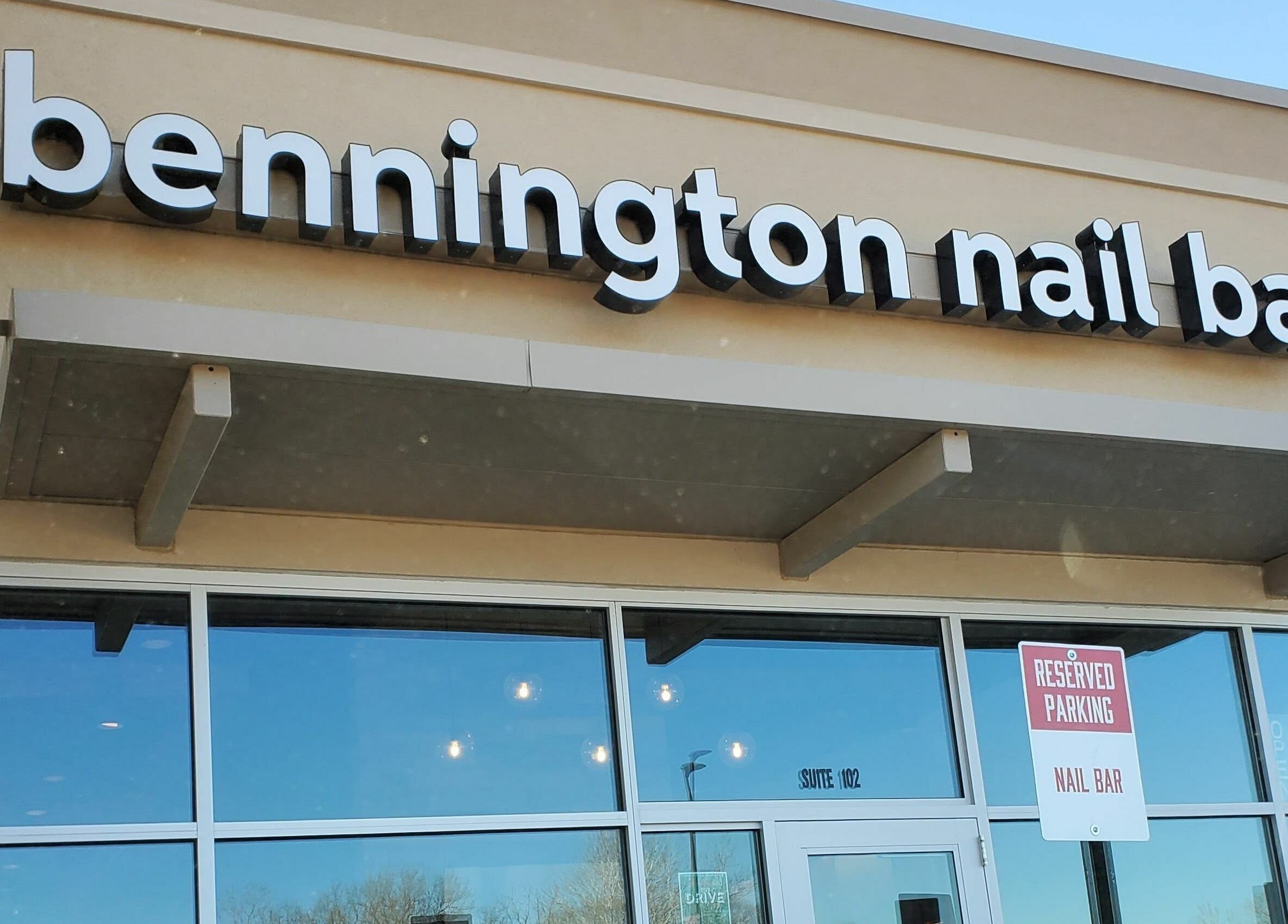 Front entrance of Bennington Nail Bar in Bennington, Nebraska, US with clear signage.