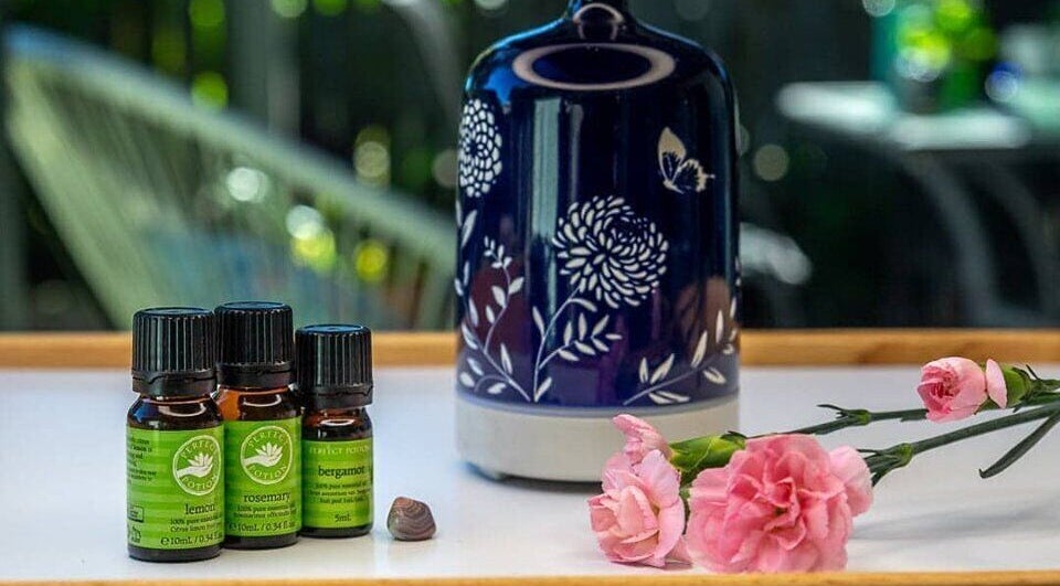 Aromatherapy oils and flowers at Living Well Essentials in Birkdale, Queensland, AU create a relaxing ambiance.