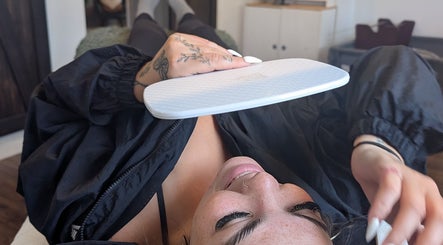 Relaxing therapy session at Claire'ity Care in Blackfalds, Alberta, CA with a soothing energy device.
