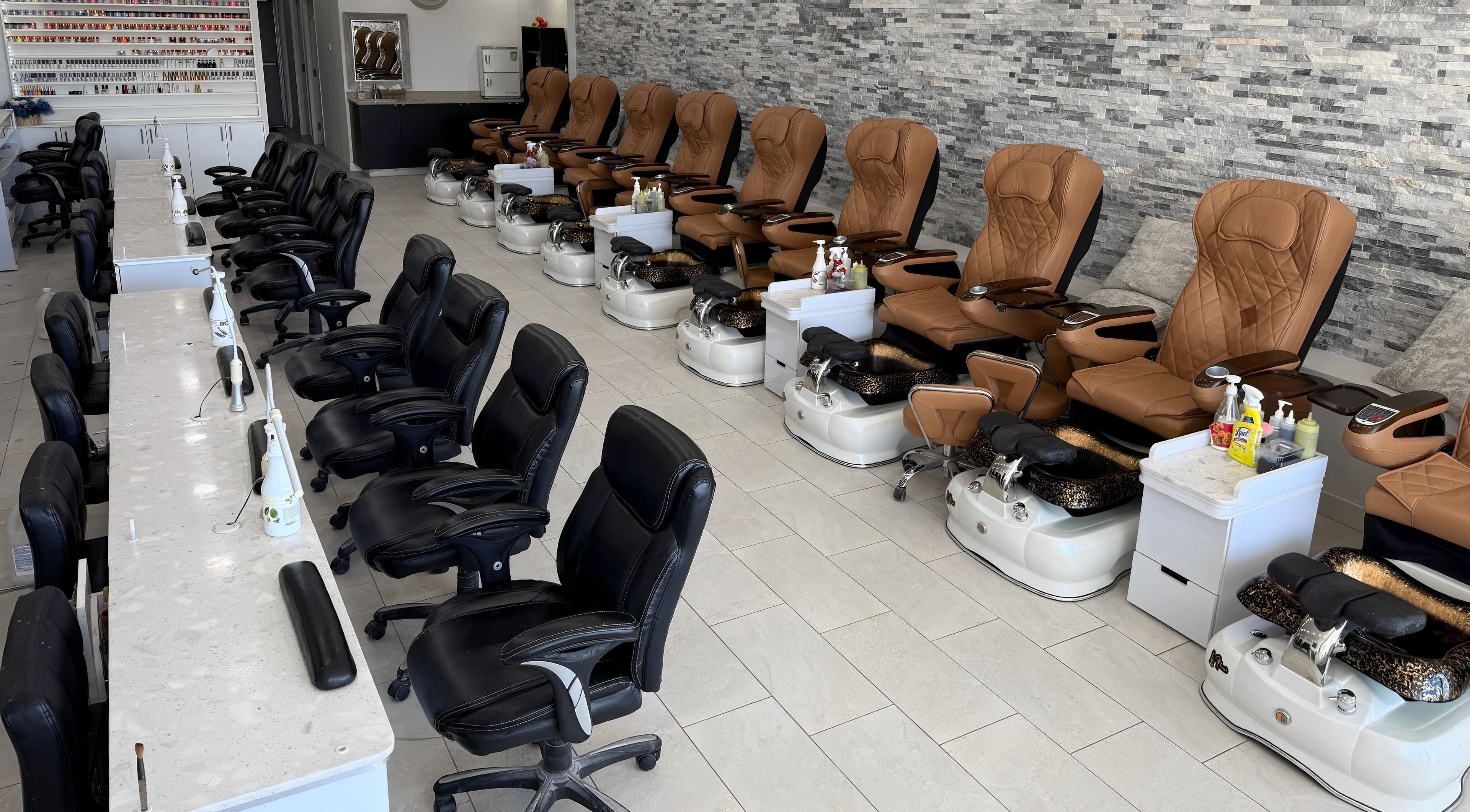 Pedi N Nails - Hespeler Cambridge interior showing plush seating and nail stations in Cambridge, Ontario, CA.