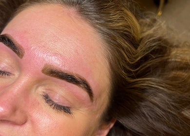 Closeup of perfectly shaped brows after treatment at Brows By Poppy, Brentwood, England, GB.