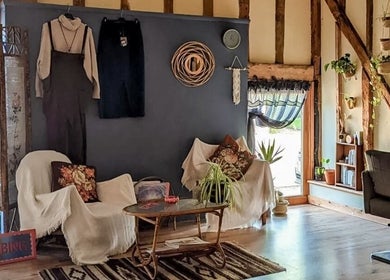 Cozy interior of HIVEhair by Tabbie in The Barn, Wrentham, England, GB. Featuring a rustic, inviting decor.