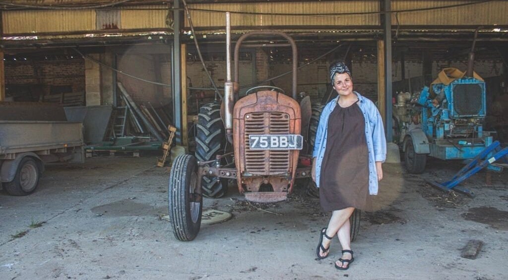 Charming indoor space at HIVEhair by Tabbie in The Barn, Wrentham, England, GB featuring vintage tractor.