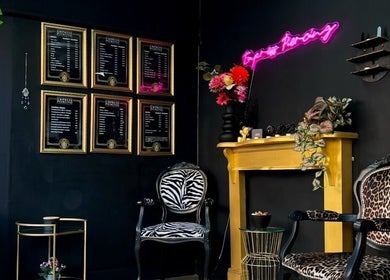 Stylish seating area in Empress Piercing Cardiff, featuring eclectic decor in Cardiff, Wales, GB.