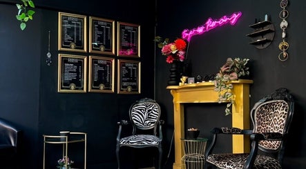 Stylish seating area in Empress Piercing Cardiff, featuring eclectic decor in Cardiff, Wales, GB.