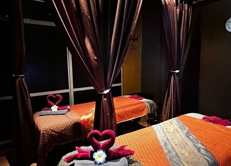 Luxurious massage room at Siam Wellness Centre and Beauty Spa, Kota Kinabalu, Sabah, MY, with elegant decor.