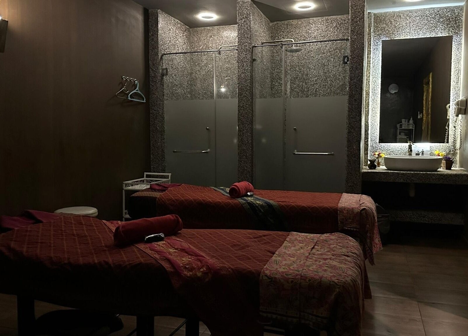 Relaxing massage room at Siam Wellness Centre and Beauty Spa, Kota Kinabalu, Sabah, MY, featuring twin massage beds.