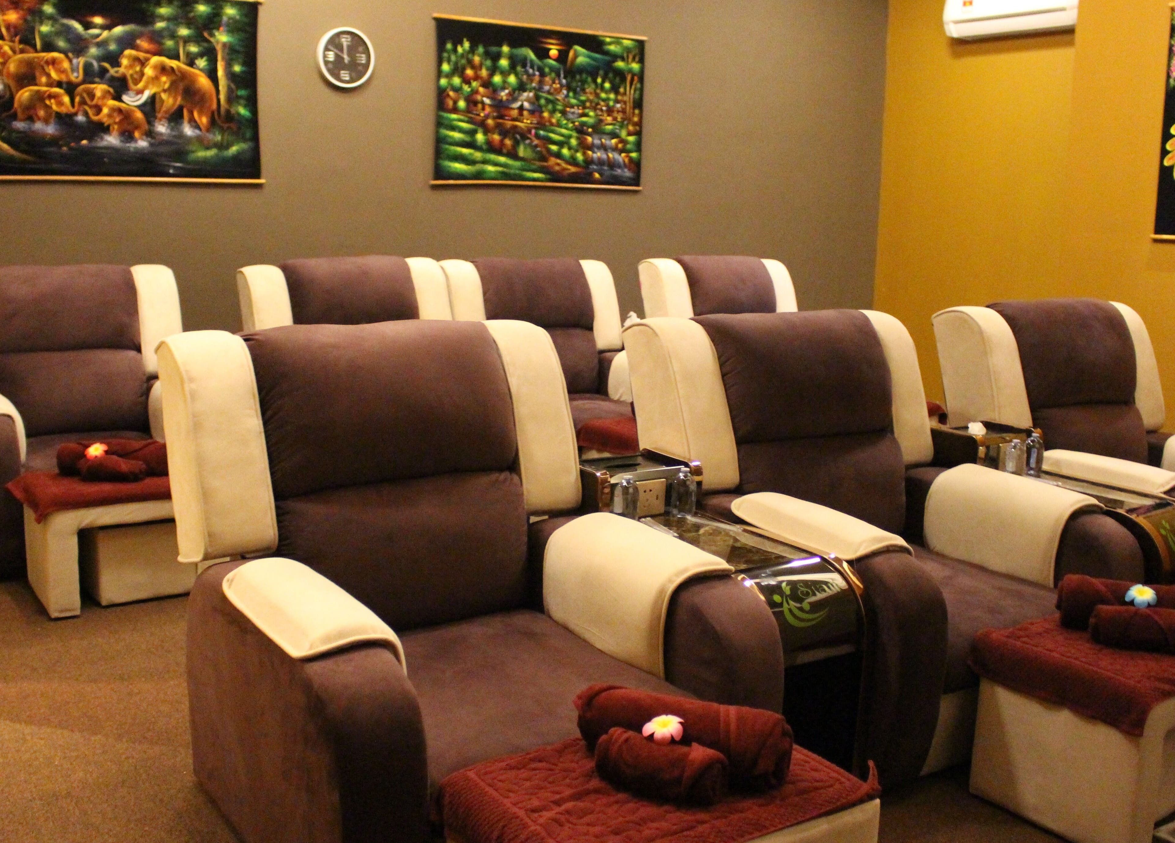 Cozy massage chairs at Siam Wellness Centre and Family Spa, Cheras, Selangor, MY with calming decor.