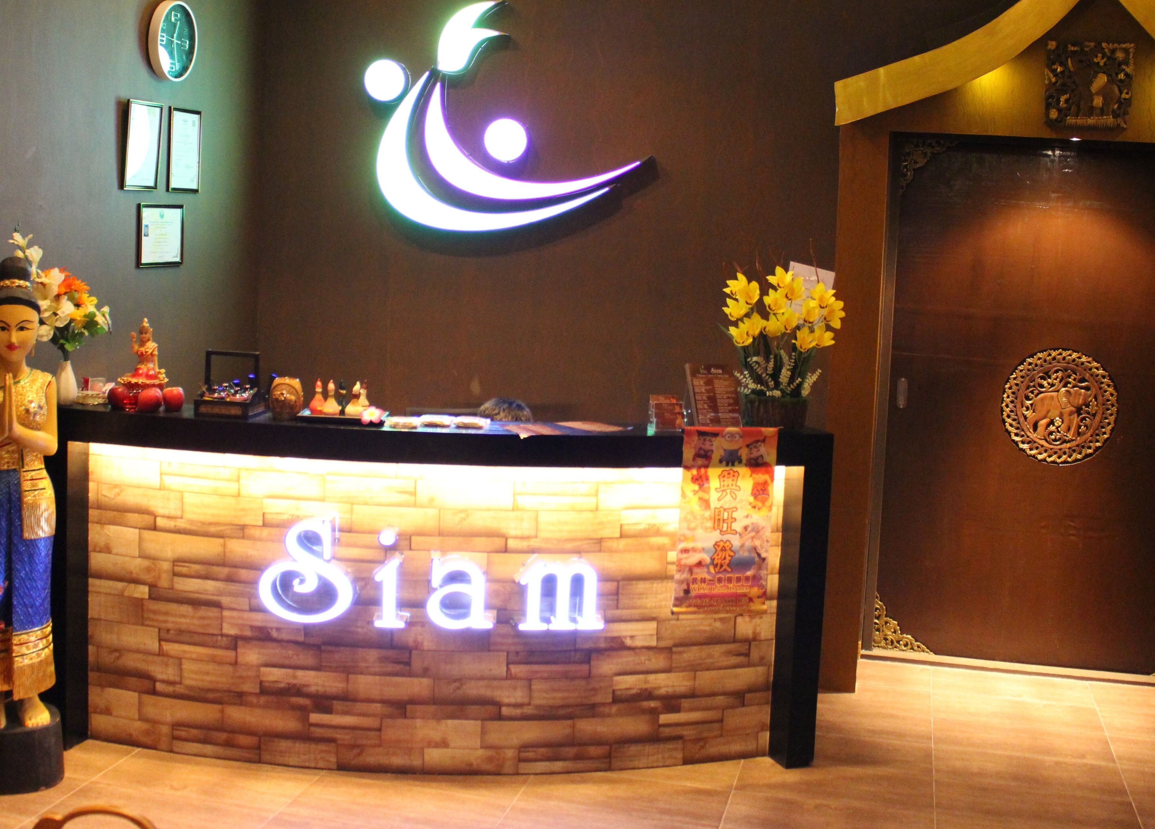 Reception at Siam Wellness Centre and Family Spa in Cheras, Selangor, MY with warm lighting and decor.