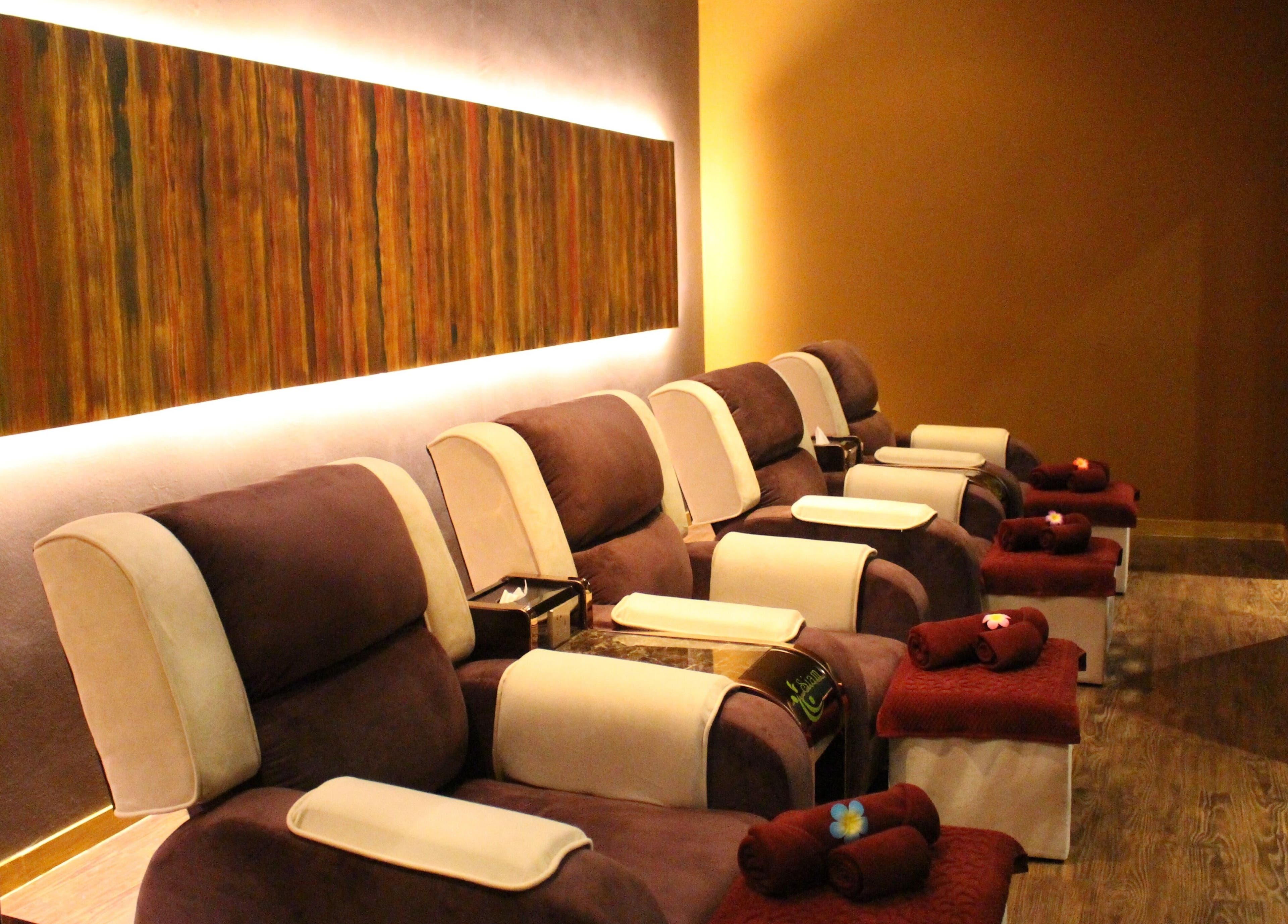 Plush massage chairs at Siam Wellness Centre and Family Spa, Cheras, Selangor, MY for ultimate relaxation.