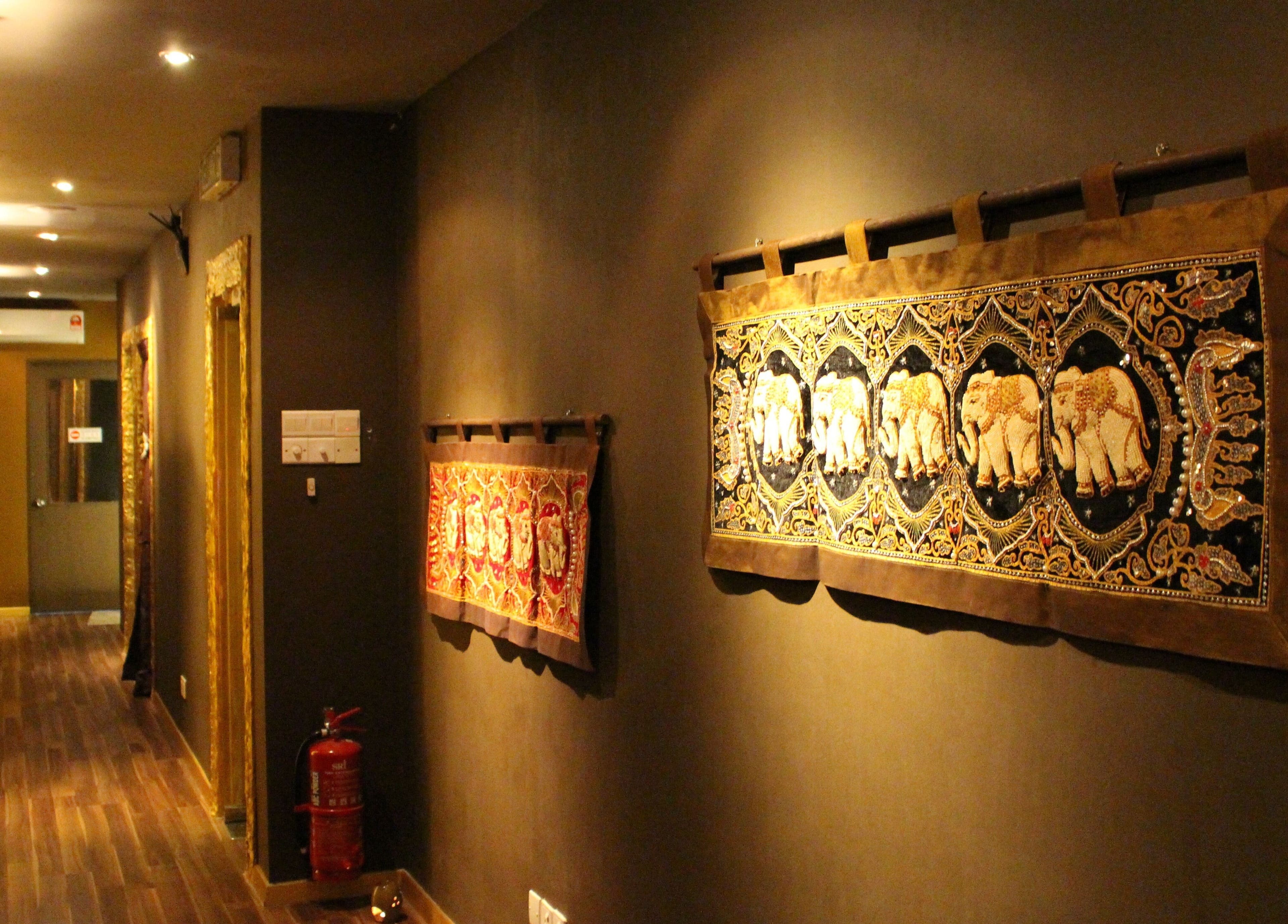 Decorated corridor at Siam Wellness Centre and Family Spa, Cheras, Selangor, MY, with ornate textile art.