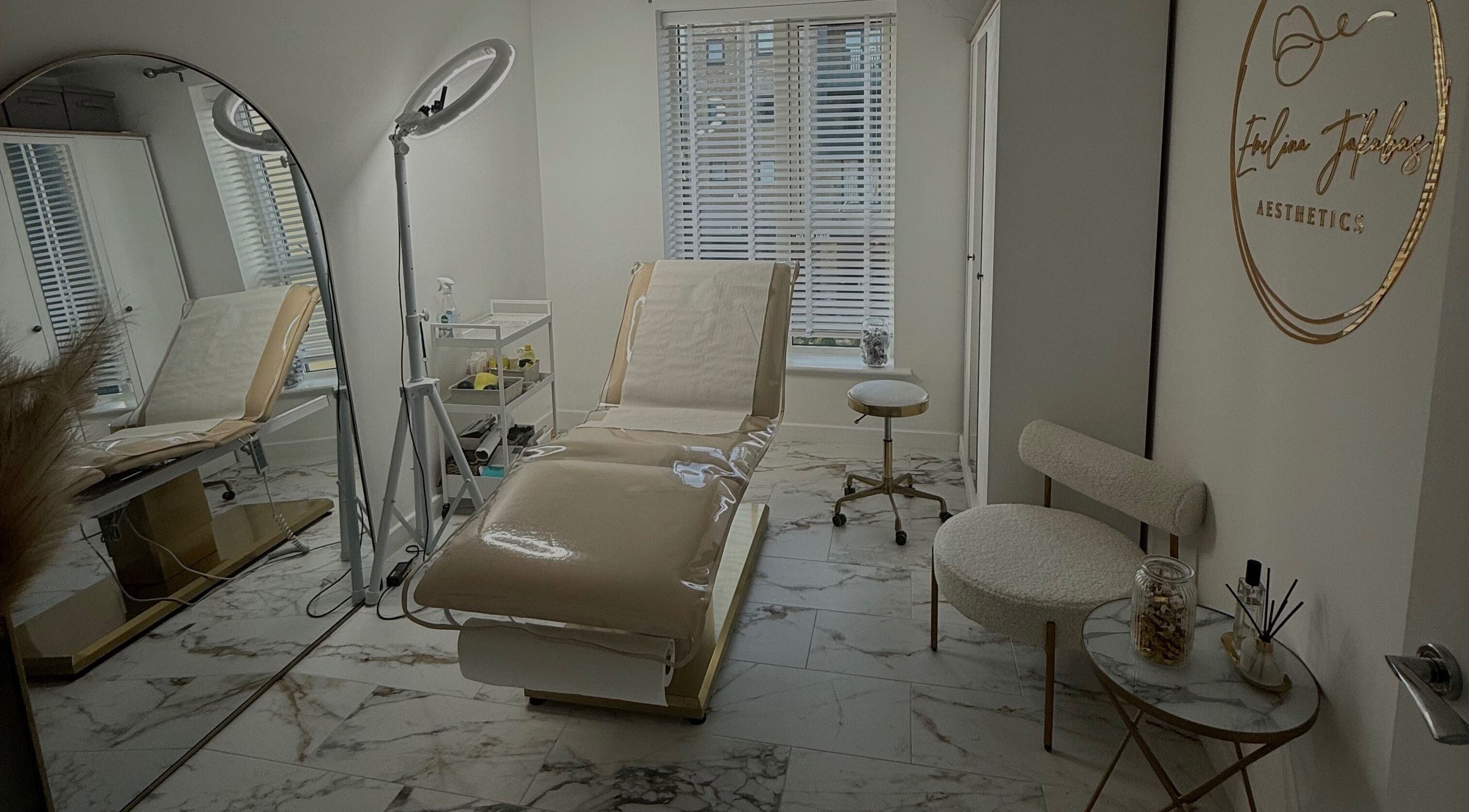 Modern treatment room at Ewelina Jakubus Aesthetics, Harlow, England, GB. Features sleek decor and professional lighting.