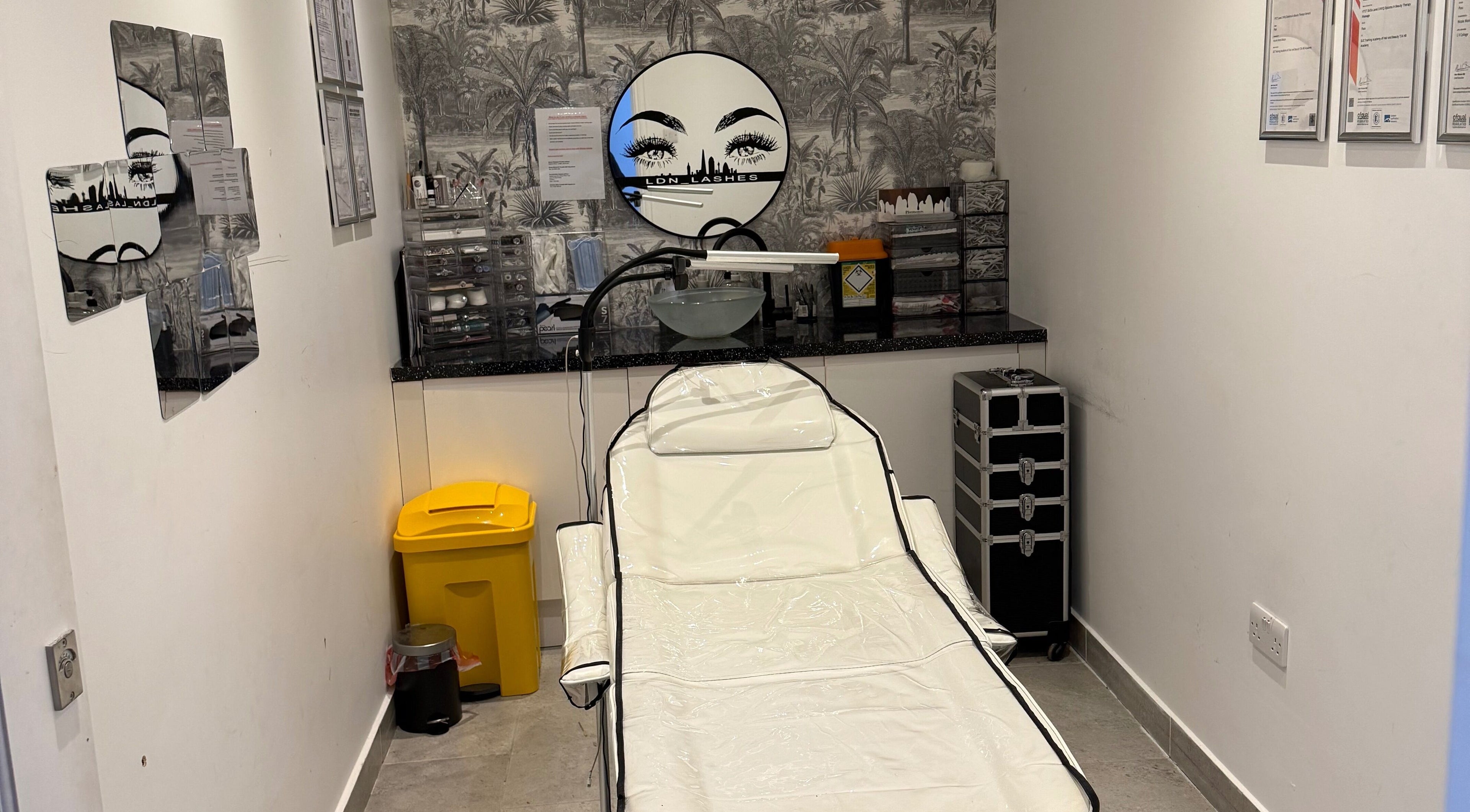 Ldn Lashes salon in Dartford, England, featuring a chic treatment room with stylish decor.