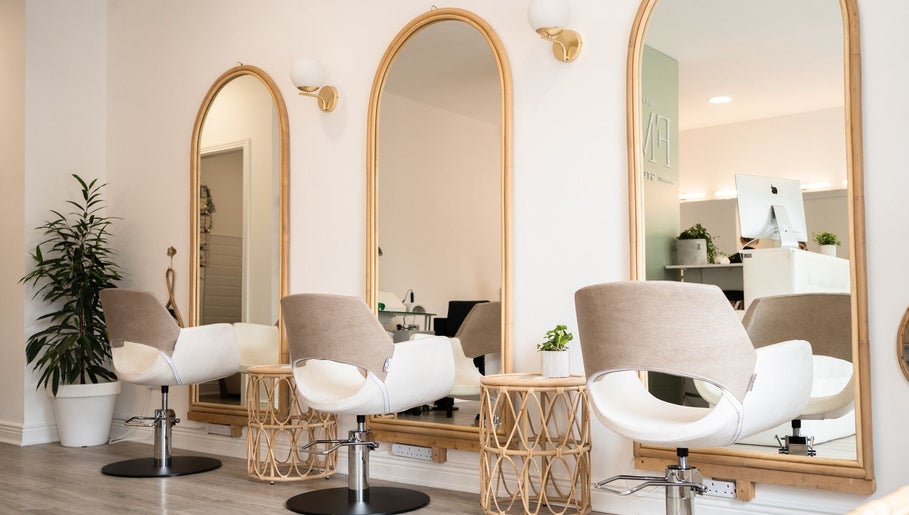 Elegant salon interior with mirrors and chairs at FMN Studio, Mungret Village, County Limerick, IE.