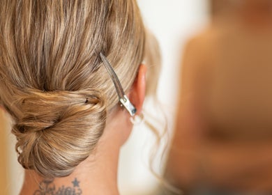 Elegant updo hairstyle at FMN Studio in Mungret Village, County Limerick, IE, showcasing blonde hair arrangement.