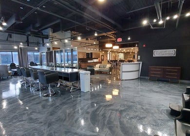 Modern interior of Multimedia Makeup Academy of Michigan in Troy, Michigan, US with stylish salon setup.