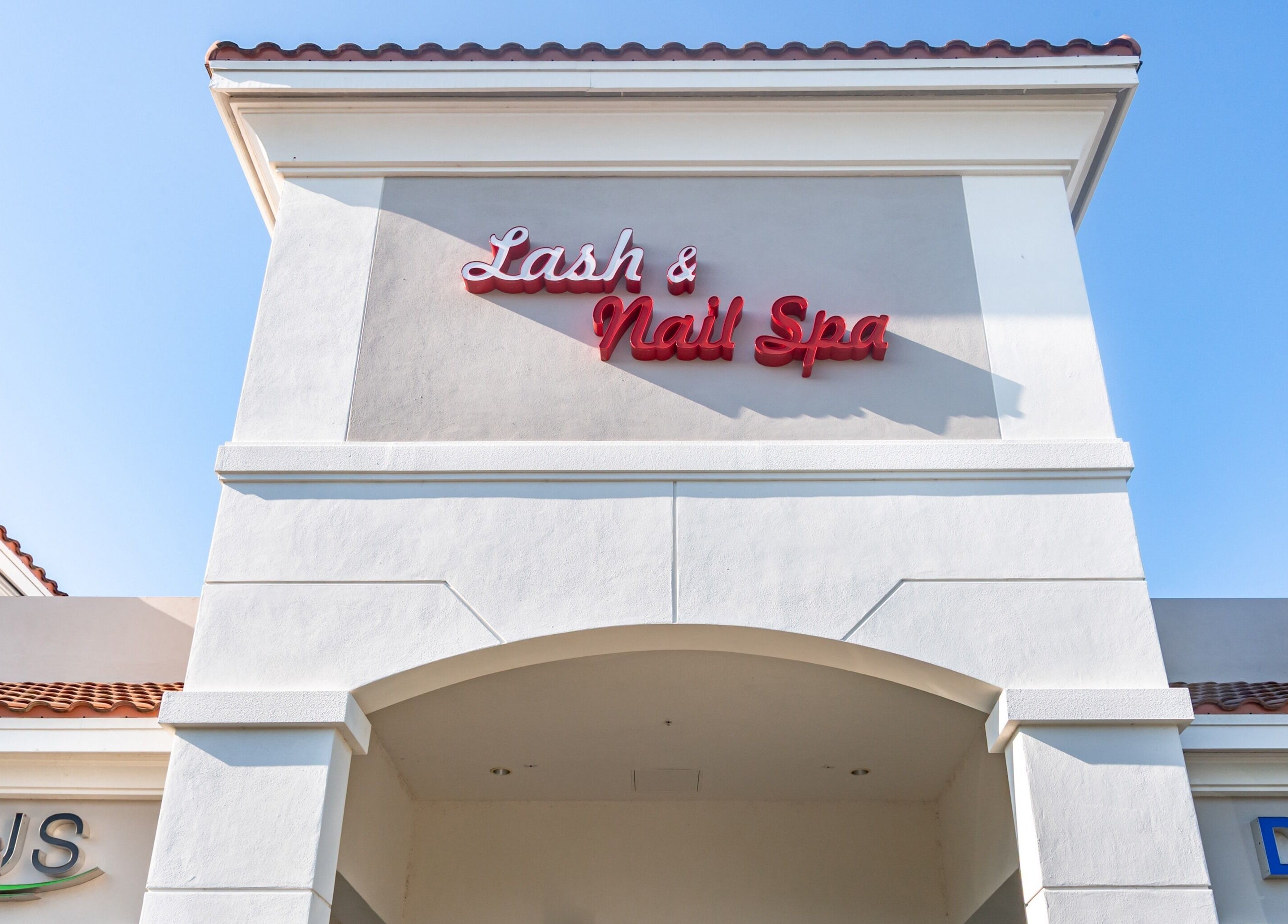 Front view of Lash and Nail Spa in Miramar, Florida, showcasing the elegant signage and entrance.