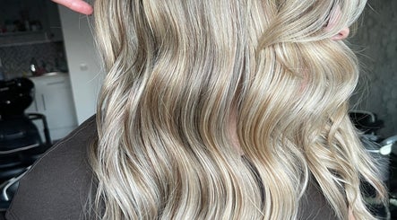 Blonde wavy hair styled by Roxanne Hair at Seafield Salon, Inverness, Scotland, GB.