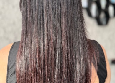 Smooth, straight hair styled at Roxanne Hair at Seafield Salon, Inverness, Scotland, GB.