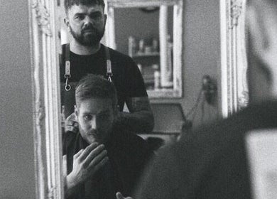 Travis Manning Hair Consultant working on a client in Great Yarmouth, England, GB.
