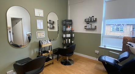 Modern salon interior at Missfitt Bespoke Hair Solutions, Penarth, Wales, GB, featuring stylish decor and seating.