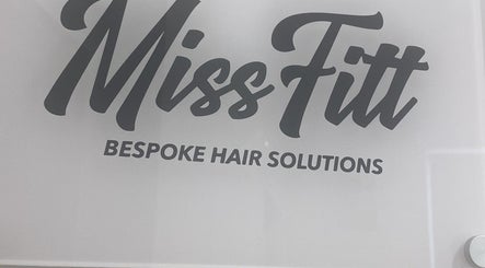 Sign featuring Missfitt Bespoke Hair Solutions, located in Penarth, Wales, GB, showcasing brand identity.