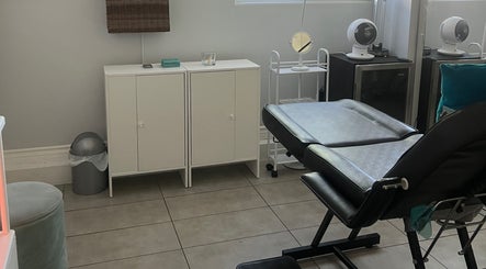 Cozy treatment room at LadyFace, Rancho Cucamonga, California, US, featuring a comfortable black chair.