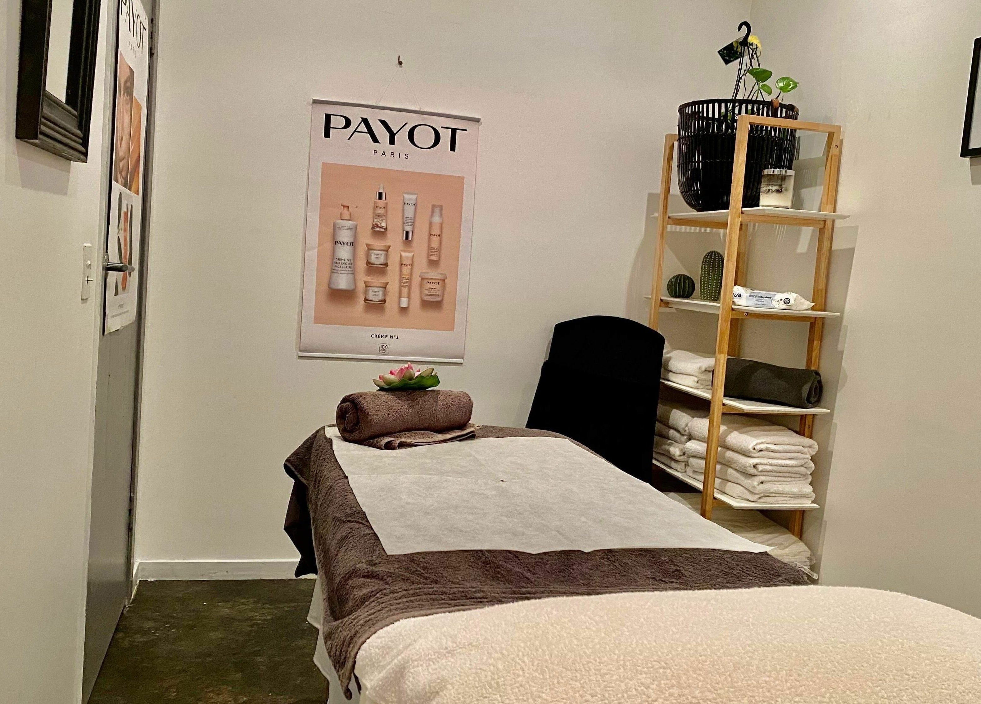 Cozy treatment room at Belle Isle Manly in Manly, New South Wales, AU featuring a massage table and relaxing decor.