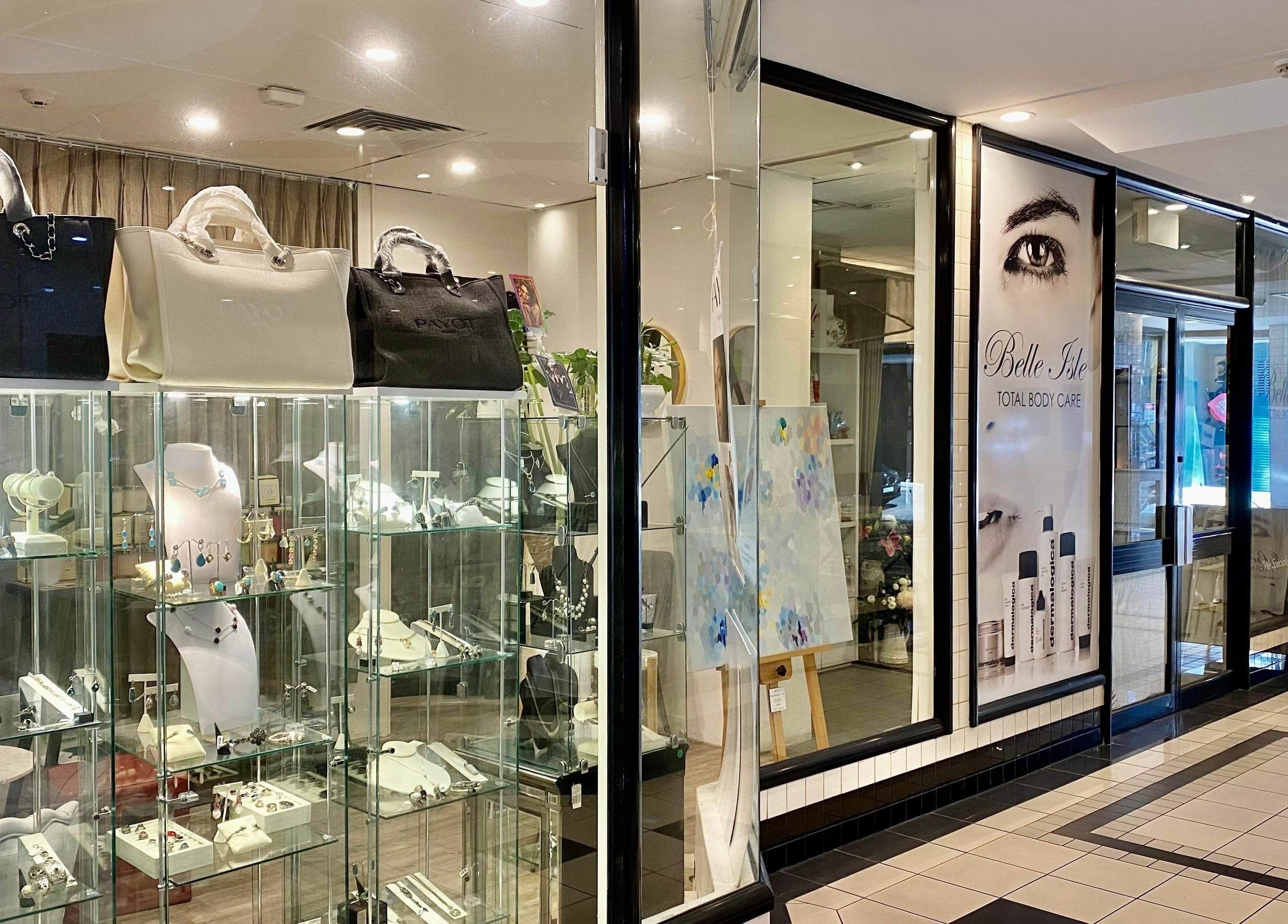 Elegant front view of Belle Isle Manly, showcasing luxury bags and jewelry, Manly, New South Wales, AU.