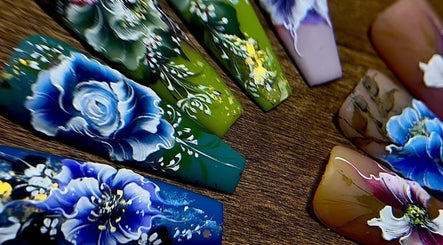 Intricate floral nail art display at Bespoke Nail & Lash By Tran, Fairfield Heights, New South Wales, AU.