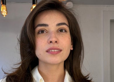 A woman with radiant skin at David Nukri, Frederiksberg, Denmark, DK enjoying a wellness session.