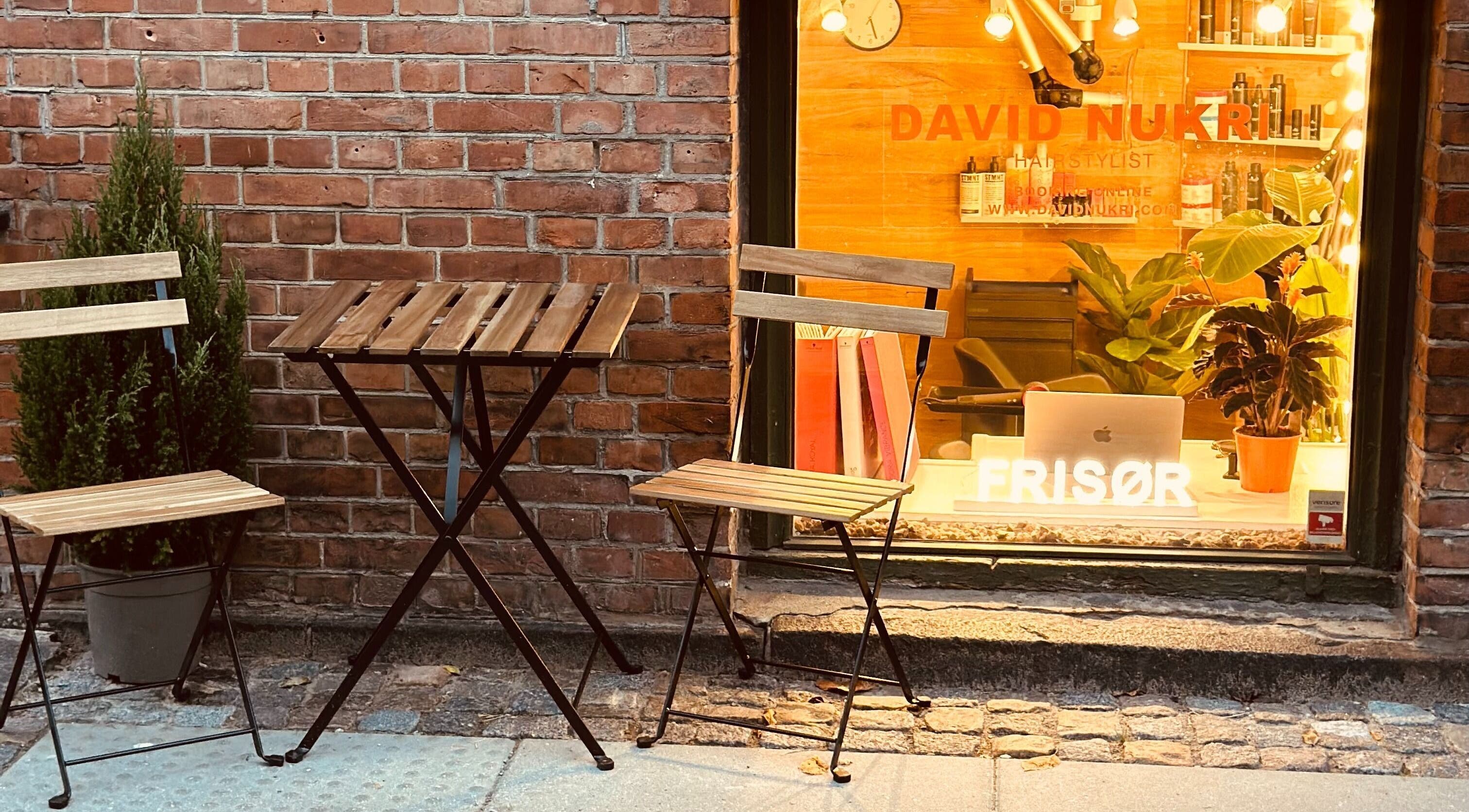 David Nukri salon facade with cozy seating in Frederiksberg, Denmark, DK.