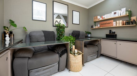 Relaxed seating area at Golden Olive | Nail & Lash Bar, Cape Town, Western Cape, ZA with stylish decor.