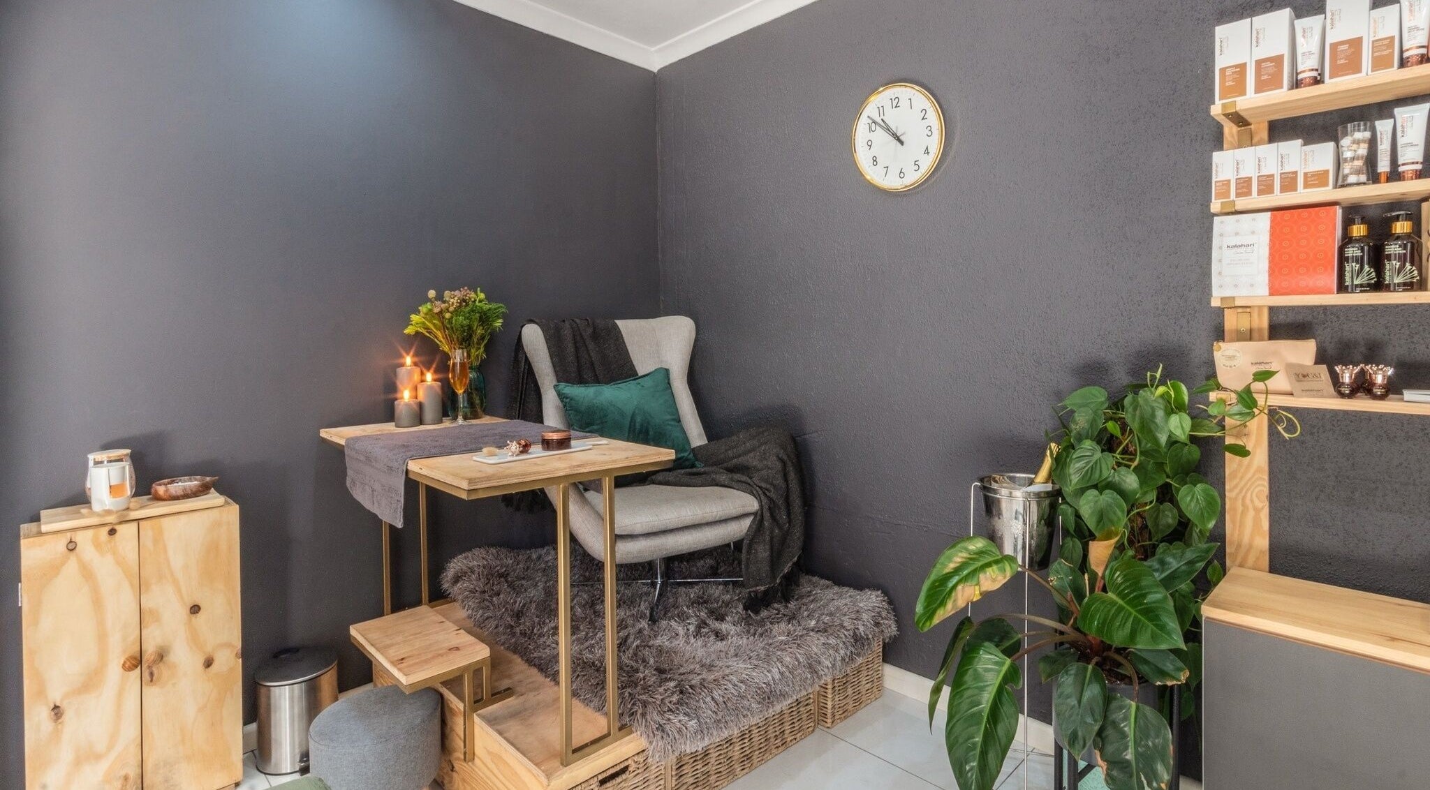 Relaxing treatment area at Golden Olive | Beauty Studio, Cape Town, Western Cape, ZA with plush seating and decor.