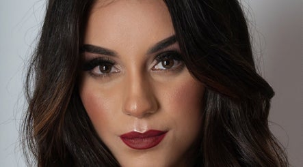 Close-up of elegant makeup look by Art In Makeup, Il-fgura, MT, showcasing bold lips and defined eyes.