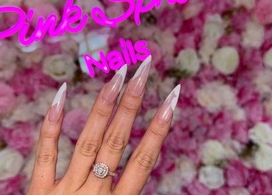 Stylish nail art at Pink Sphinx Nails in Binbrook, Ontario, CA with floral backdrop.