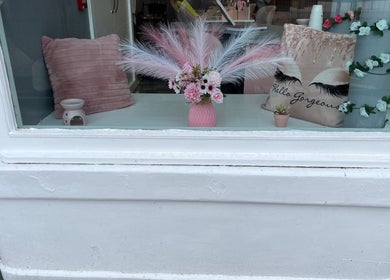 Elegant floral decor in window display at Nails and Beauty By Lauren Cowan, Ayr, Scotland, GB.