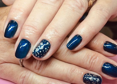 Blue nail art with silver accents at Nails and Beauty By Lauren Cowan, Ayr, Scotland, GB.