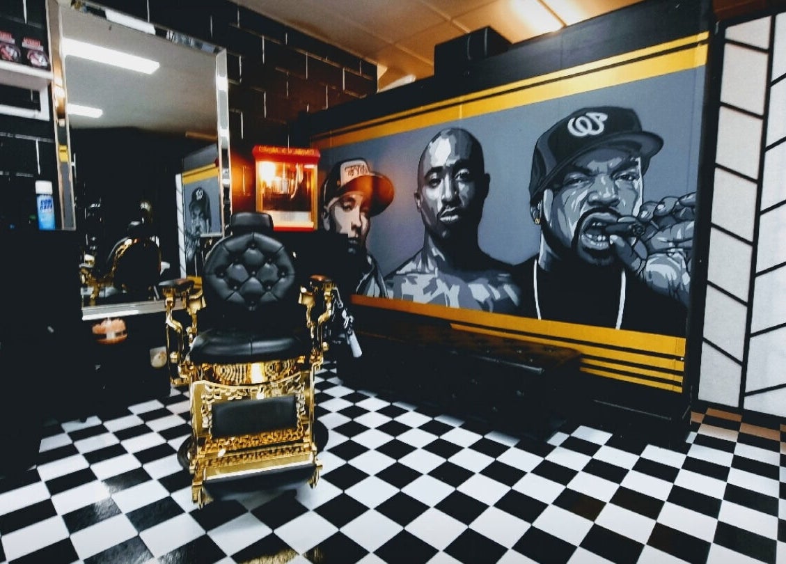 Stylish barbershop interior with bold artwork at Timeless Barber Co - Nerang, located in Nerang, Queensland, AU.